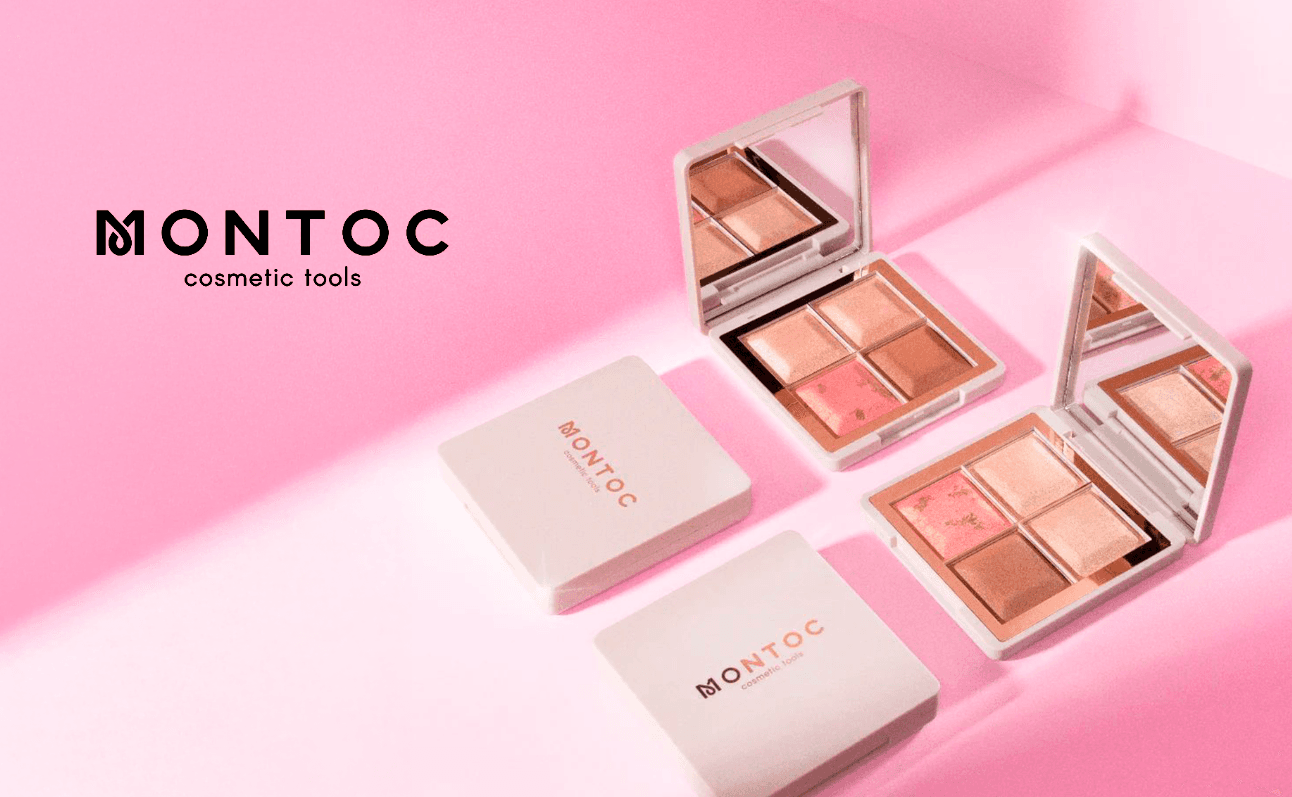 MONTOC cosmetic tools with makeup palettes on pink background